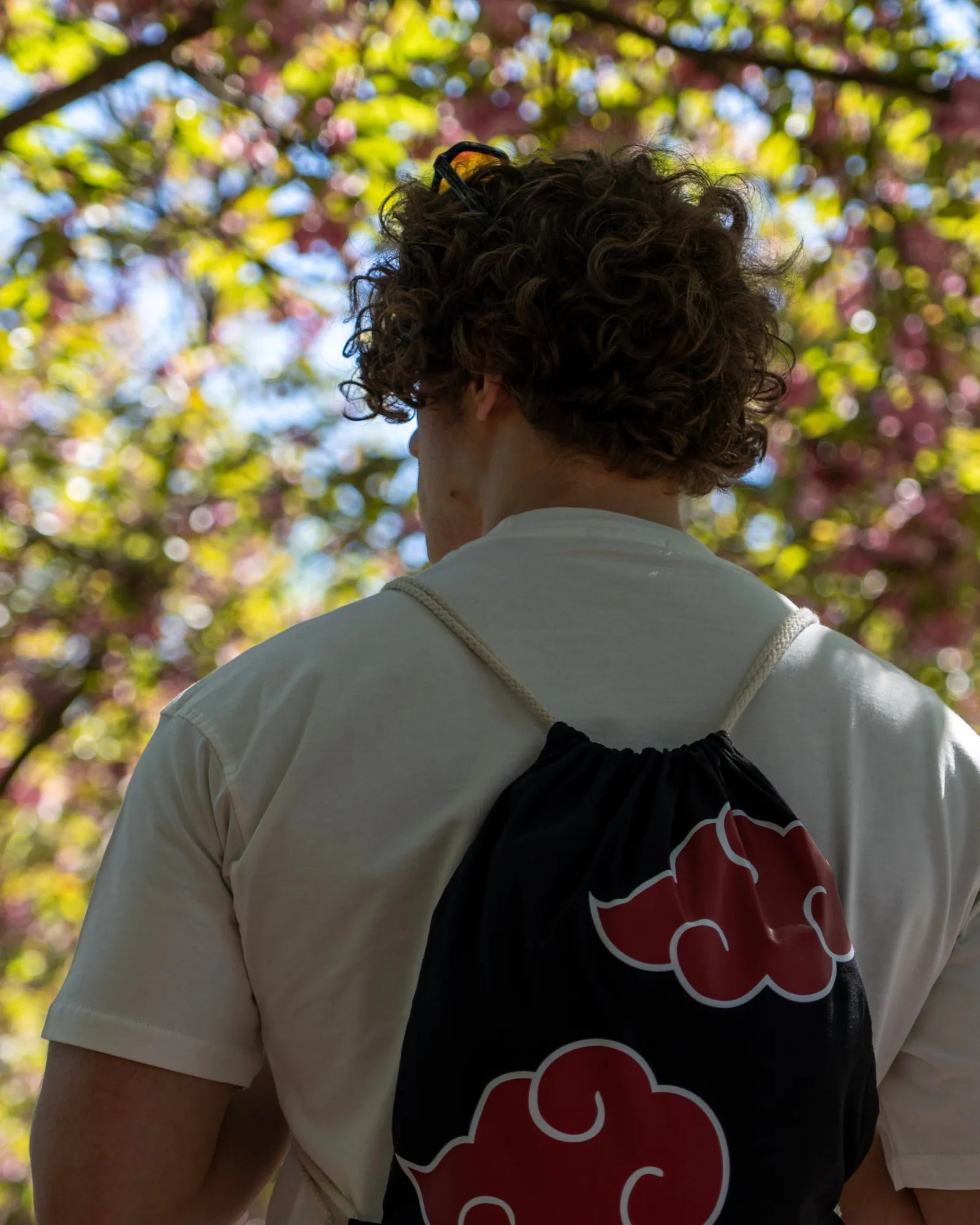 Close-up of AKATSUKI X SPORT BAG DTF print – high-quality durable print on black cotton fabric with iconic Akatsuki design.