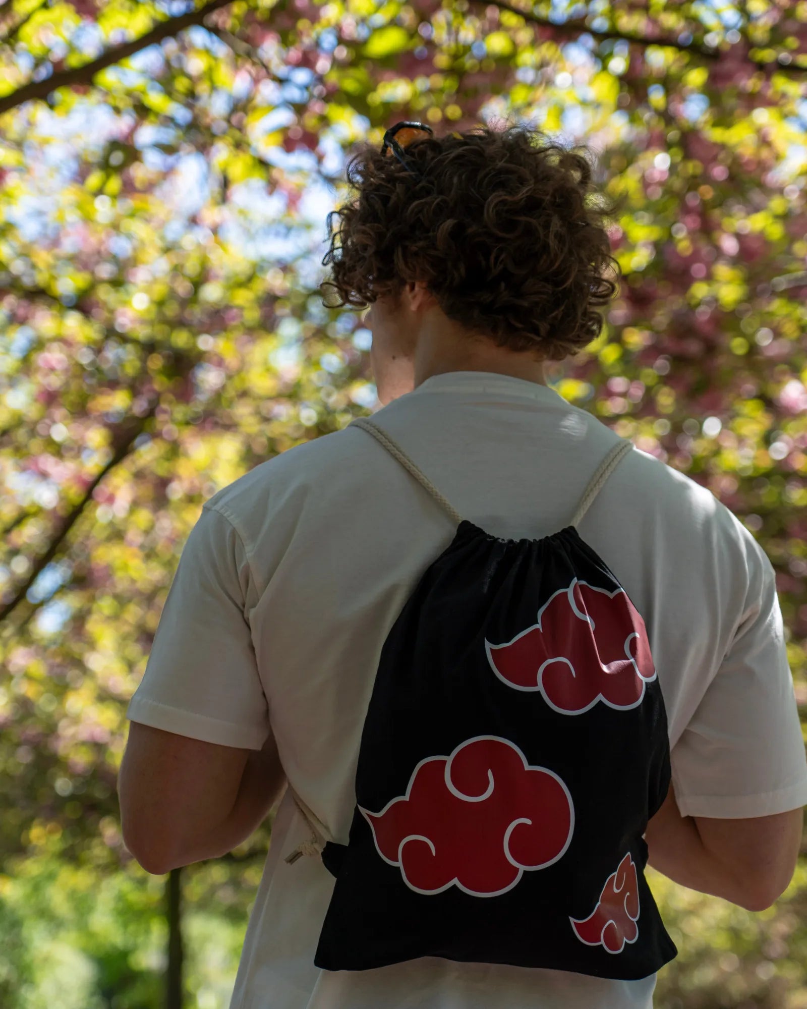 AKATSUKI X SPORT BAG front view – stylish black gym bag with red Akatsuki cloud design, durable cotton, drawstring closure.